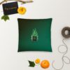 Sinister festive Halloween pillow, with greens over an expressively eerie black background.