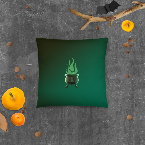 Sinister festive Halloween pillow, with greens over an expressively eerie black background.