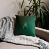 Sinister festive Halloween pillow, with greens over an expressively eerie black background.