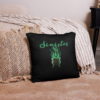 Sinister festive Halloween pillow, with greens over an expressively eerie black background.