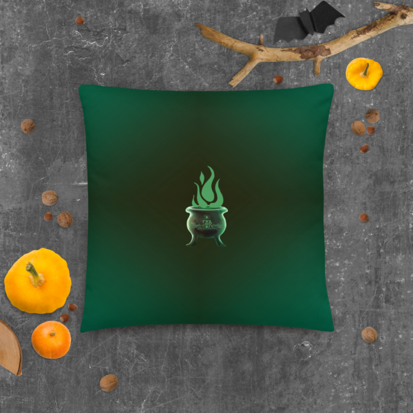 Sinister festive Halloween pillow, with greens over an expressively eerie black background.