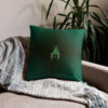 Sinister festive Halloween pillow, with greens over an expressively eerie black background.