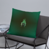 Sinister festive Halloween pillow, with greens over an expressively eerie black background.